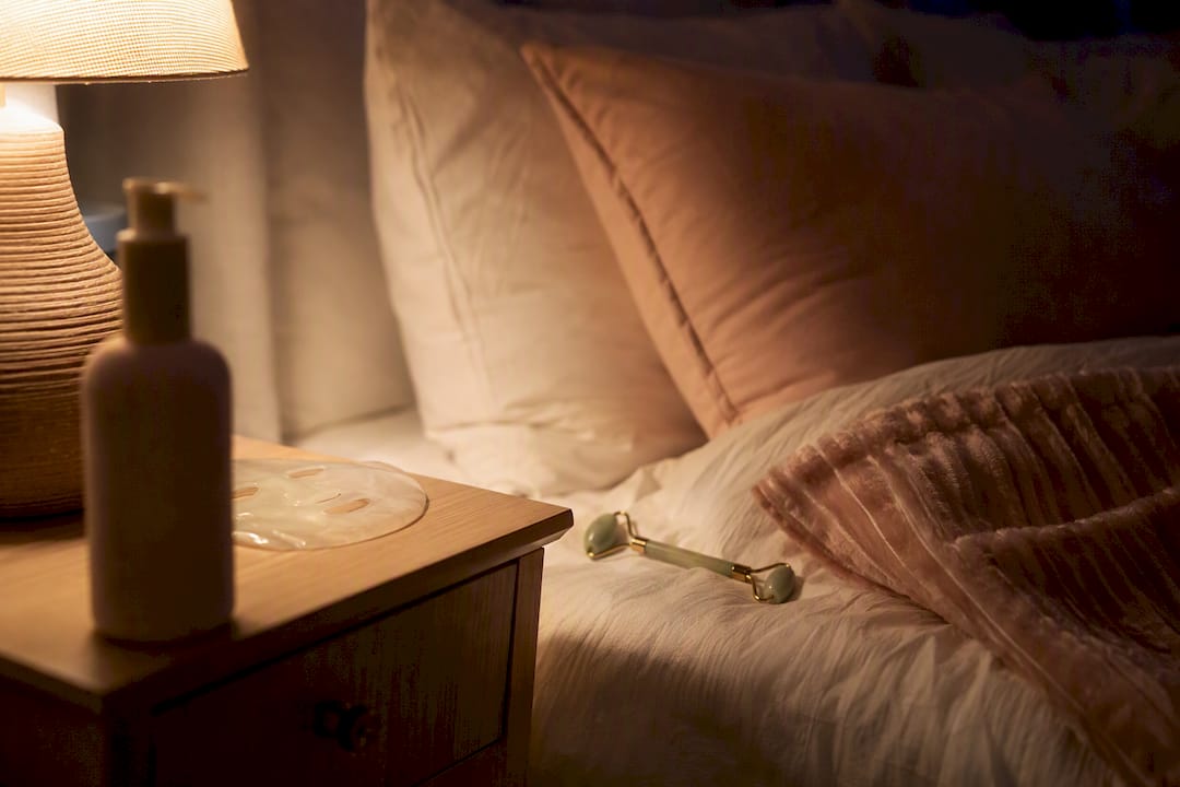 Nighttime skincare setup on bedside table